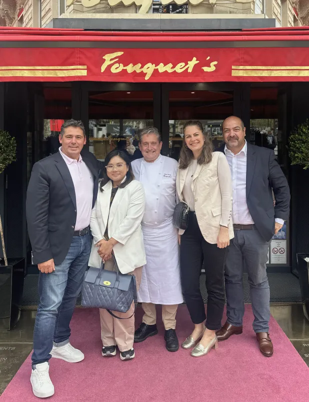Partner photo in front of a restaurant