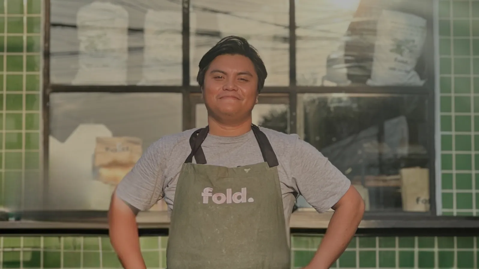 A baker from Fold wearing an apron